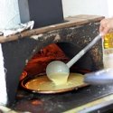 Pouring the Socca batter