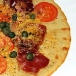 A Socca Pizza without the gluton